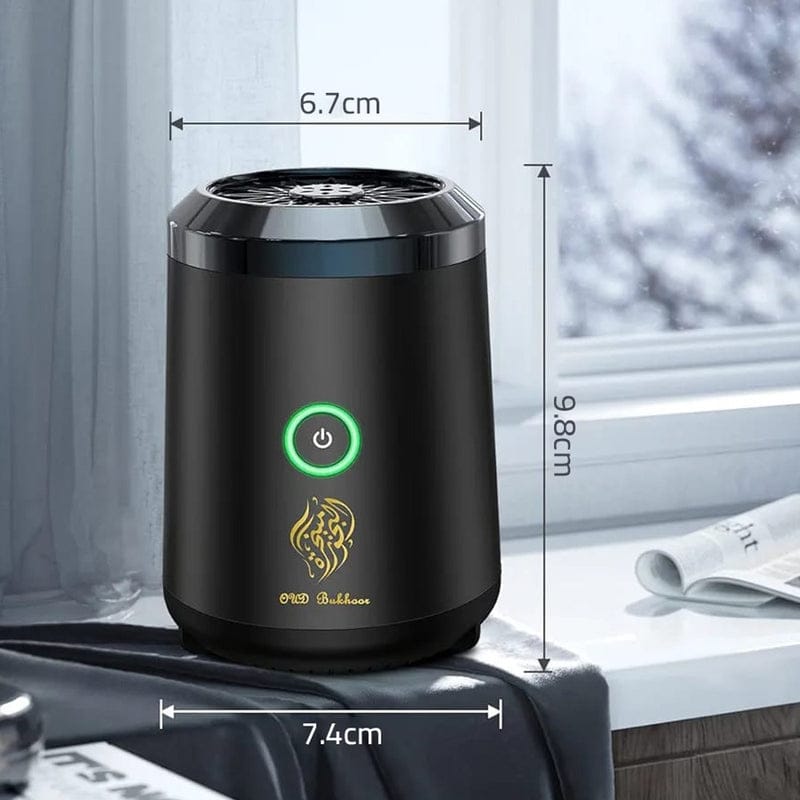 Black electronic device with measurements on a blurred indoor background
