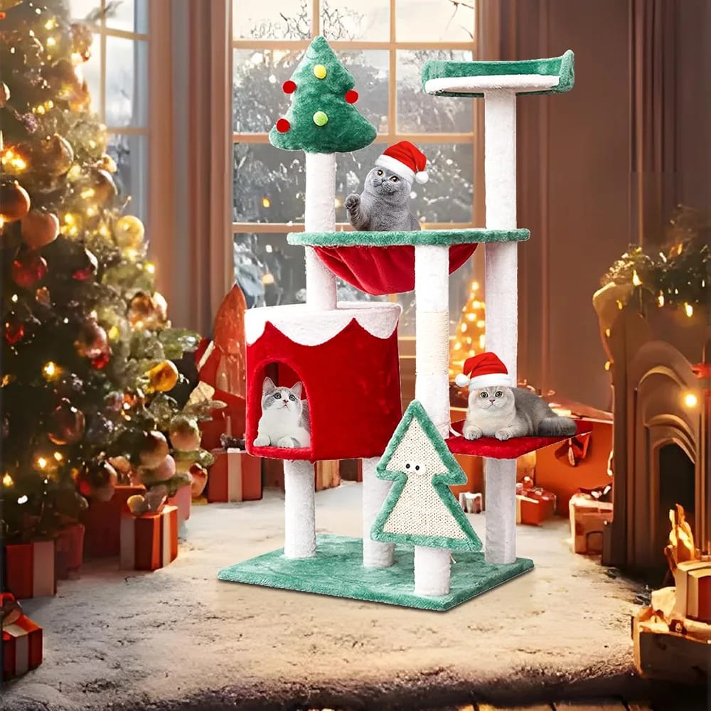 A Christmas-themed multi-level cat tree with several cats wearing Santa hats, set in a cozy, warmly lit holiday living room next to a decorated Christmas tree and fireplace.