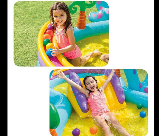 Two children playing in a colorful inflatable water park on a grassy background.