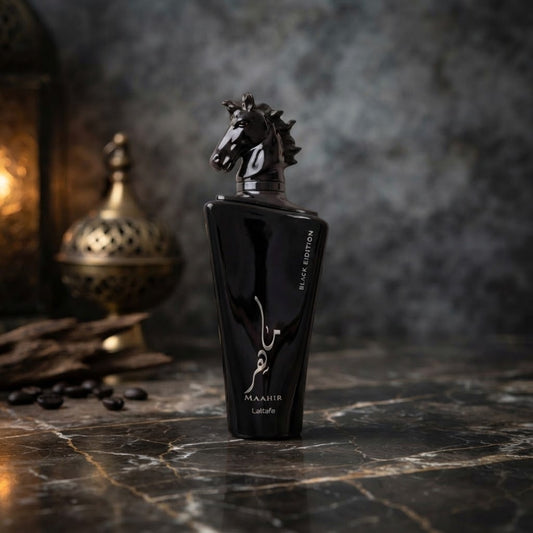 Lattafa Maahir Black Edition Eau de Parfum bottle with black horse head cap