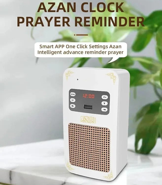 Azan clock prayer reminder with plant in the background